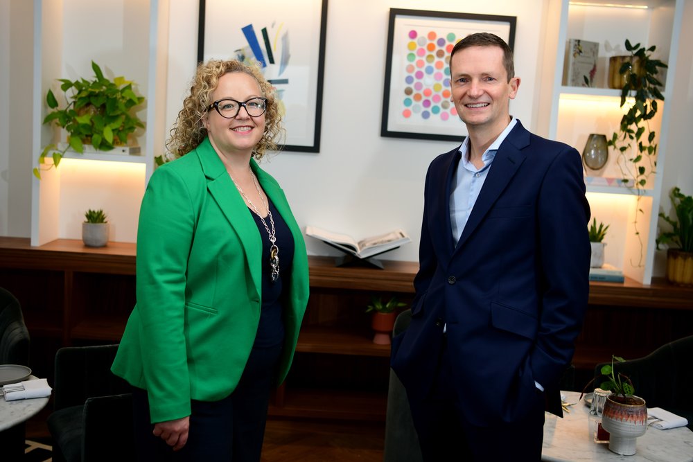 Image of woman and man in an office